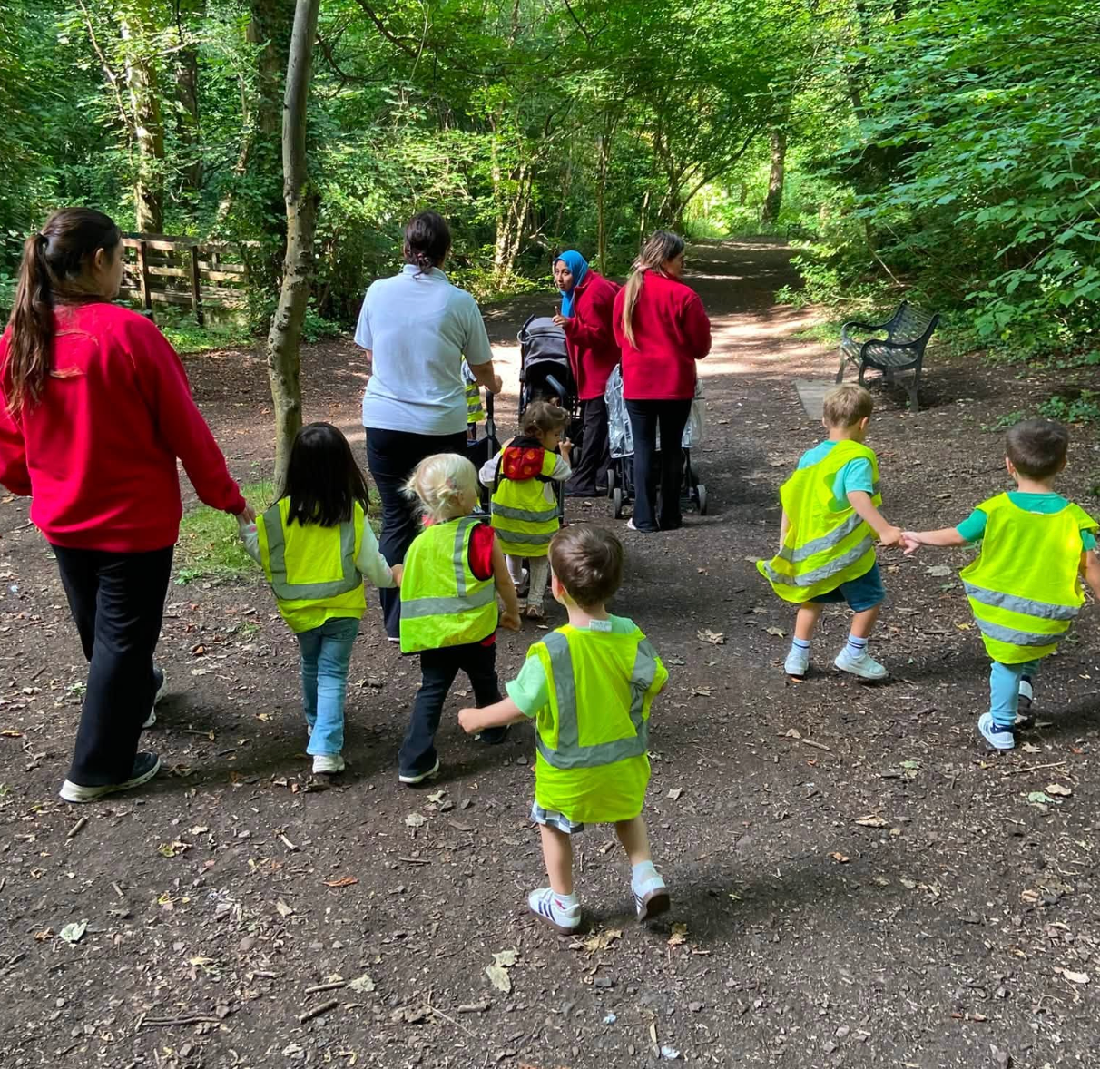 Children exploring their nursery garden together